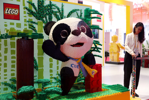  The mascot of the second China International Import Expo (CIIE) is seen at the National Exhibition and Convention Center in Shanghai, east China, Nov. 3, 2019. The layout of venues in the CIIE is basically ready, with some exhibitors making final adjustments to the exhibits. The second edition of CIIE will run from Nov. 5 to 10 in Shanghai. (Xinhua/Liu Ying)