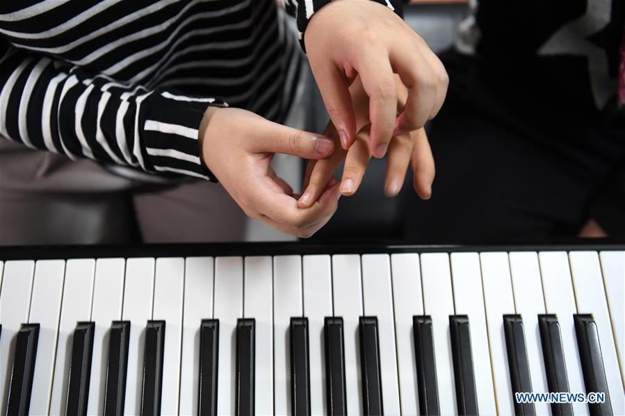 CHINA-ANHUI-SPECIAL EDUCATION-PIANO TEACHER (CN)